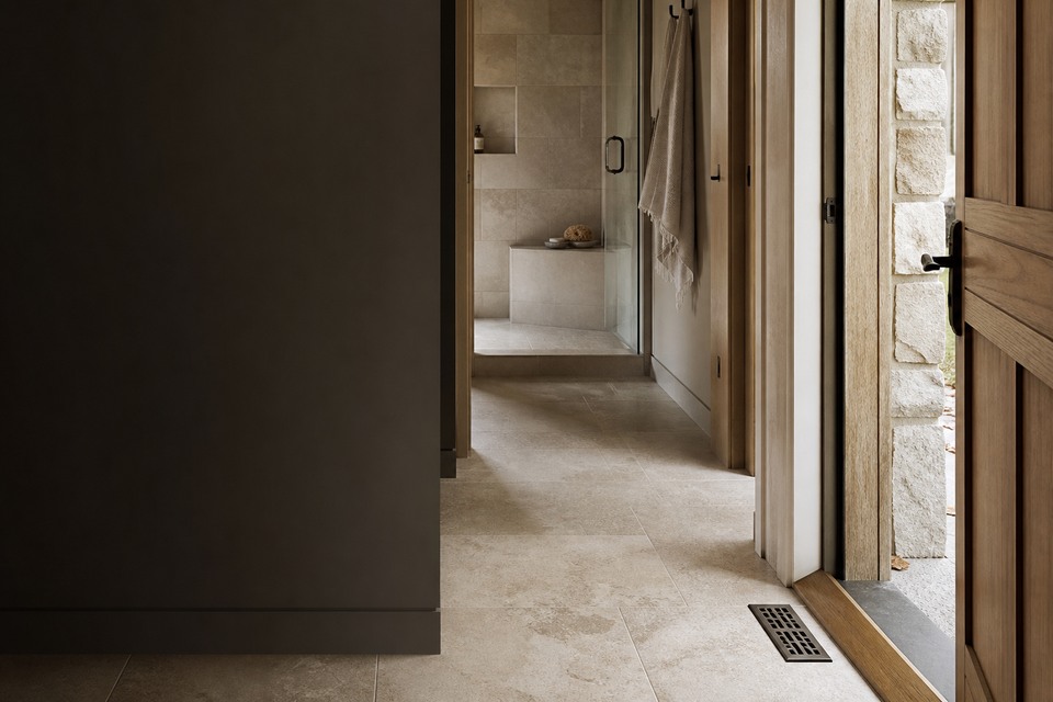 Tile installation in Caledon room view showing tile scale, joint layout and adjoining finishes
